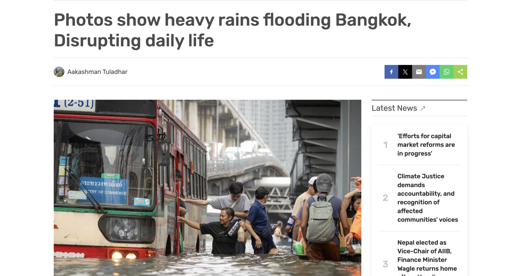 BiznessNews article: Photos show heavy rains flooding Bangkok, by Aakashman Tuladhar